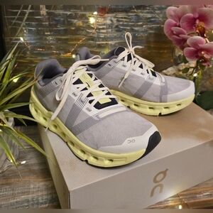 On Running Gray and White Sneakers